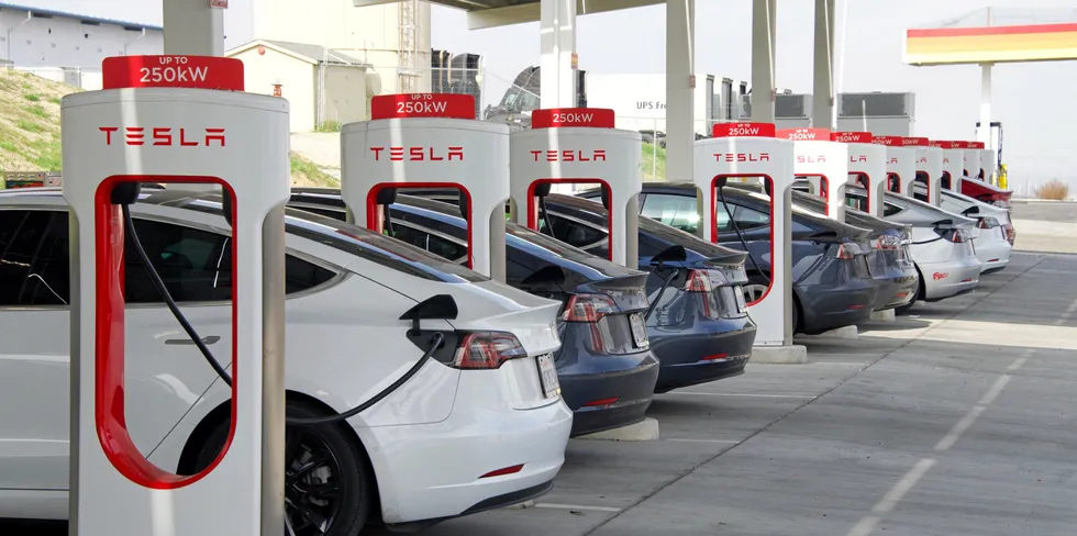 Tesla EVs charging in California.