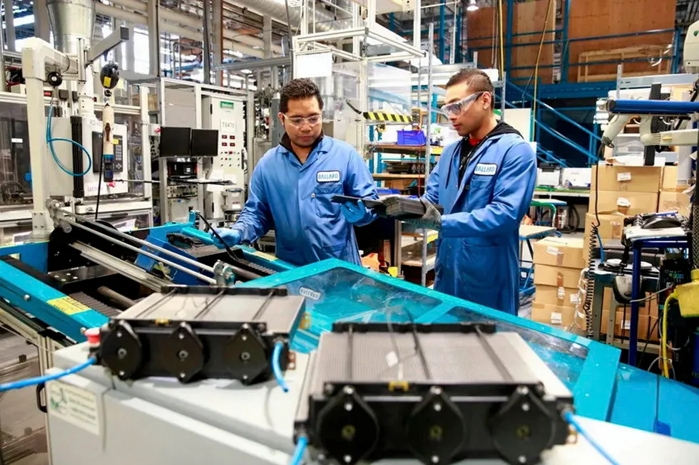 Ballard technicians assembling PEM fuel cell stacks at a factory in Burnaby, Canada.