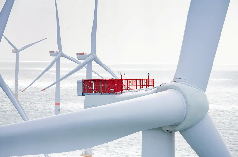 Vestas wind turbines spinning at a wind farm off the coast of Belgium.