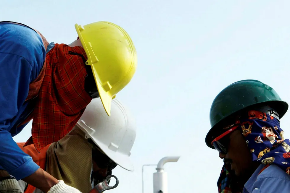 Changes: field workers on an ExxonMobil project in Indonesia
