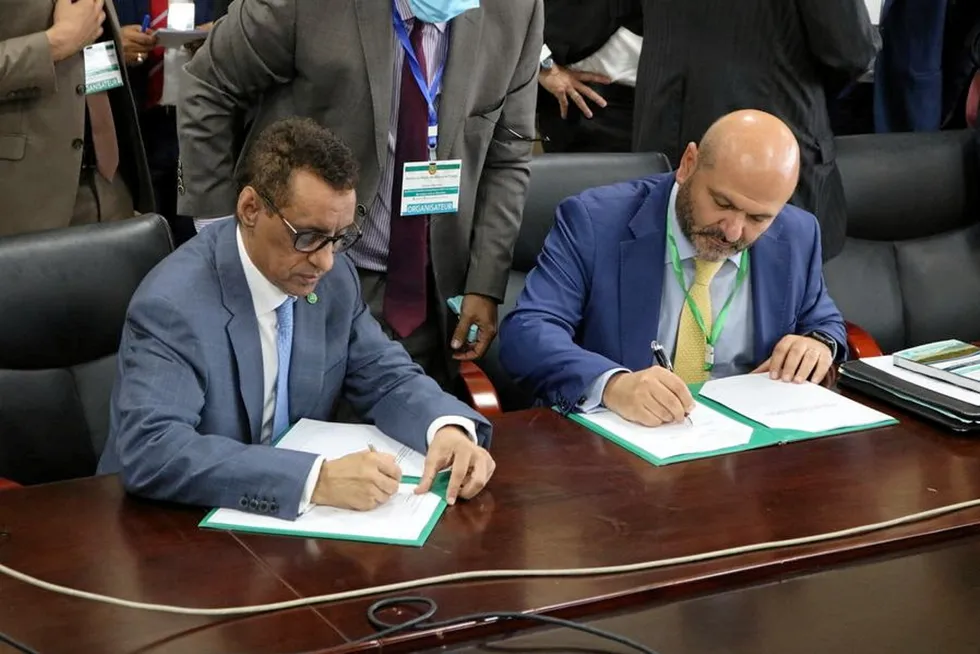 First steps: Minister of Petroleum Abdessalam Ould Mohamed (left) and Chariot chief executive Adonis Pouroulis sign green hydrogen framework deal