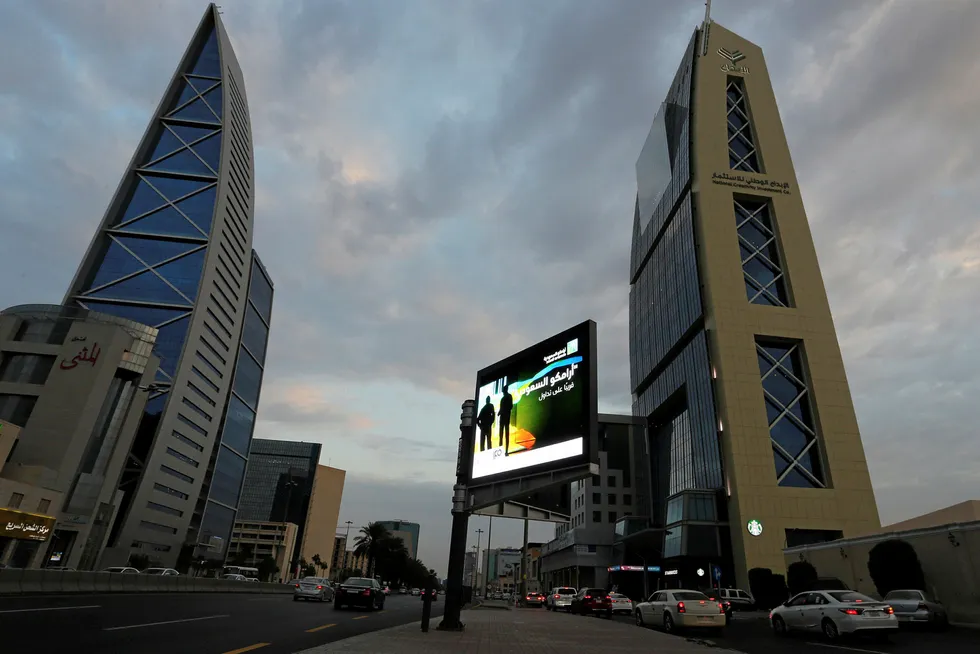 Long-term agreements: a billboard displays an advertisement for Saudi Aramco in Riyadh, Saudi Arabia