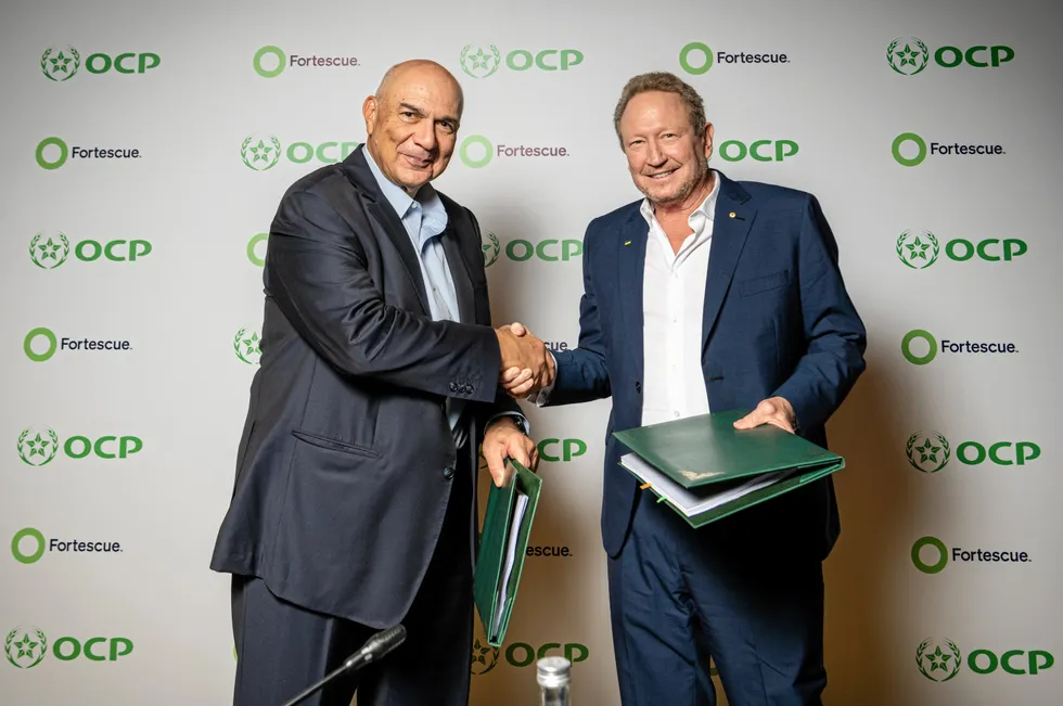 OCP CEO Mostafa Terrab shakes hands with Fortescue founder and executive chairman Andrew Forrest after signing the joint-venture agreement.