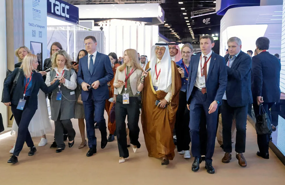 Centre stage: journalists surround Russia's Deputy Prime Minister Alexander Novak and Saudi Arabia's Energy Minister Prince Abdulaziz bin Salman at the St Petersburg International Economic Forum last week