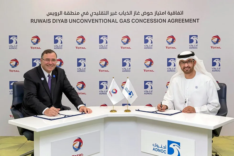 Partnership: Total chief executive Patrick Pouyanne (left) and Adnoc chief executive Sultan Ahmed al Jaber at the signing ceremony for the Ruwais Diyab concession in 2018