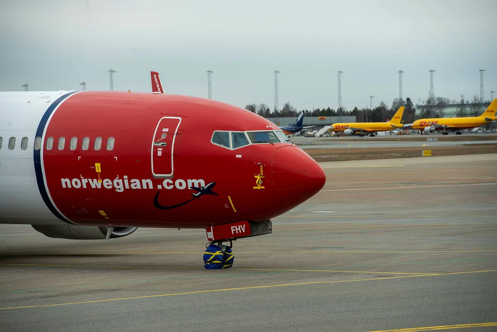 På en pressekonferanse mandag opplyste Norwegian-sjefen at selskapet kun har syv fly i drift. Bildet er tatt på Gardermoen på en tid da Norwegian hadde litt flere fly på vingene.