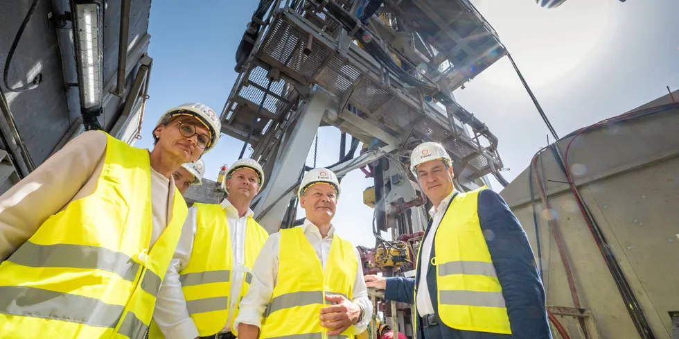 German Chancellor Olaf Scholz (second right) and Bavarian state premier Markus Söder (r) visit Eavor Loop construction site near Munich.