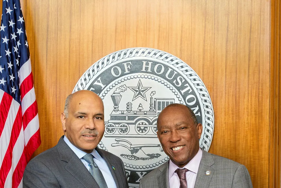 On the books: Aramco Services Company chief executive Basil Abul-Hamayel and Houston Mayor Sylvester Turner