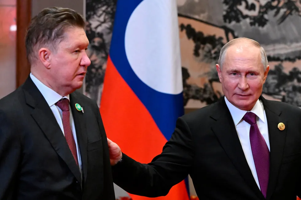 Profit sharing: Gazprom executive chairman Alexei Miller with Russian President Vladimir Putin.