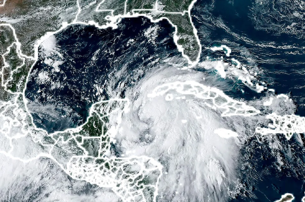 This handout satellite image shows hurricane Helene churning over the Caribbean on 24 September.