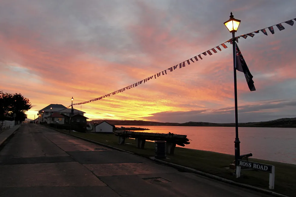 Southern skies: the sun is seen at dusk in Stanley in the Falklands Islands