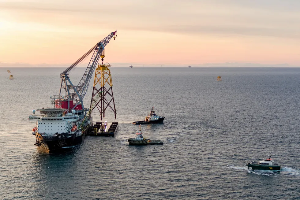 Hoist: heavy-lift vessel Seaway Strasnhov installing a foundation jacket for a wind turbine generator in UK North Sea