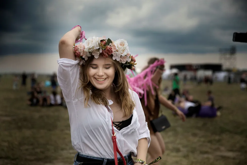 God stemning. Lulie Luczak (18) på Open'er-festivalen utenfor Gdansk - en av Nord-Europas største rockfestivaler.