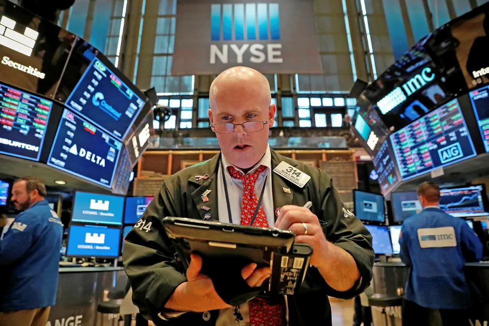 On the floor: traders at the New York Stock Exchange