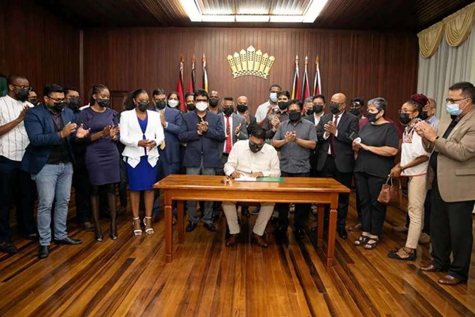 Historic: Guyana's President Mohamed Irfaan Ali signs the local content bill