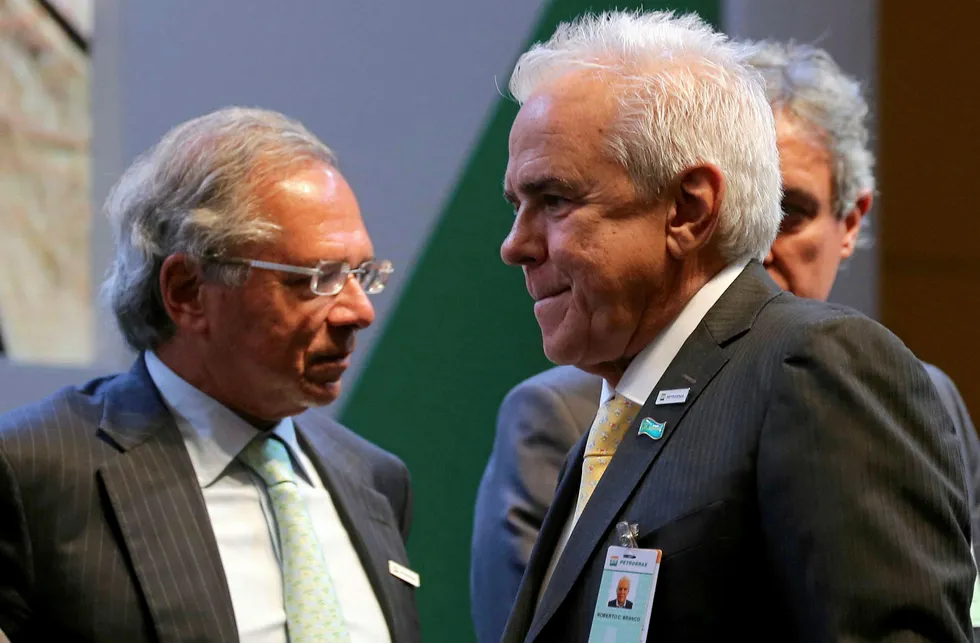 Centre stage: new Petrobras chief executive Roberto Castello Branco (right) at a ceremony marking his taking over the company with Brazil's incoming Economy Minister Paulo Guedes (left)