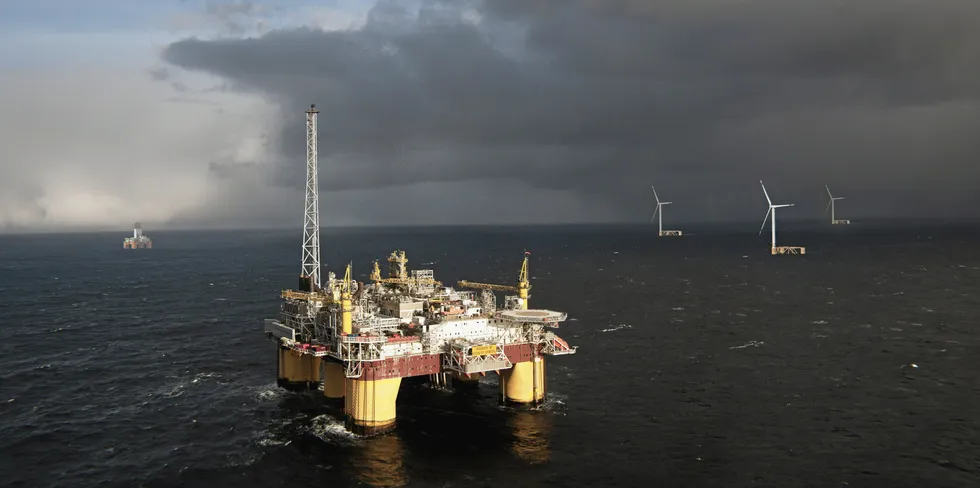 CGI of floating wind units powering an offshore oil platform