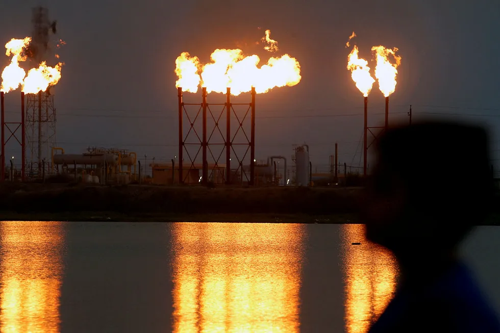 Oilfield operations: flare stacks at the Nahr Bin Umar oilfield north of Basra, Iraq