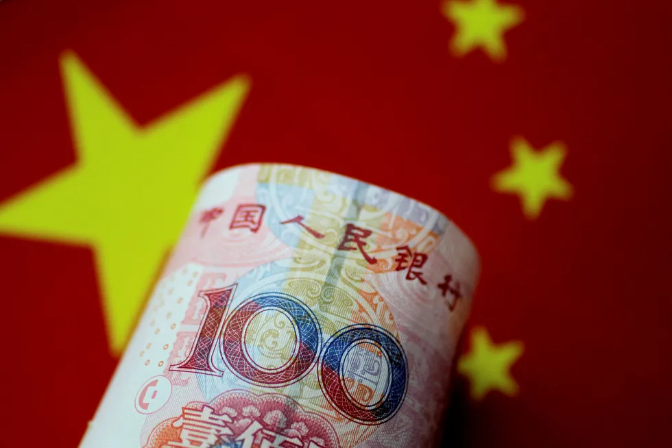FILE PHOTO: A China yuan note is seen in this illustration photo May 31, 2017. REUTERS/Thomas White/Illustration/File Photo