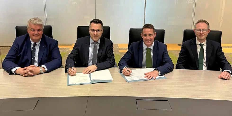 Seaway 7 and ScottishPower Renewables executives signing the deal.