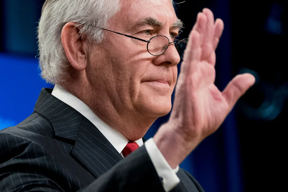 Goodbye: Secretary of State Rex Tillerson waves after a media briefing at the State Department in Washington D.C.