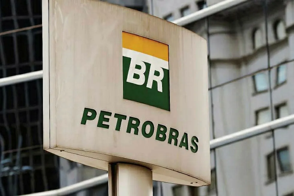 the Petrobras logo is seen in front of the company’s headquarters in Sao Paulo, Brazil . .
