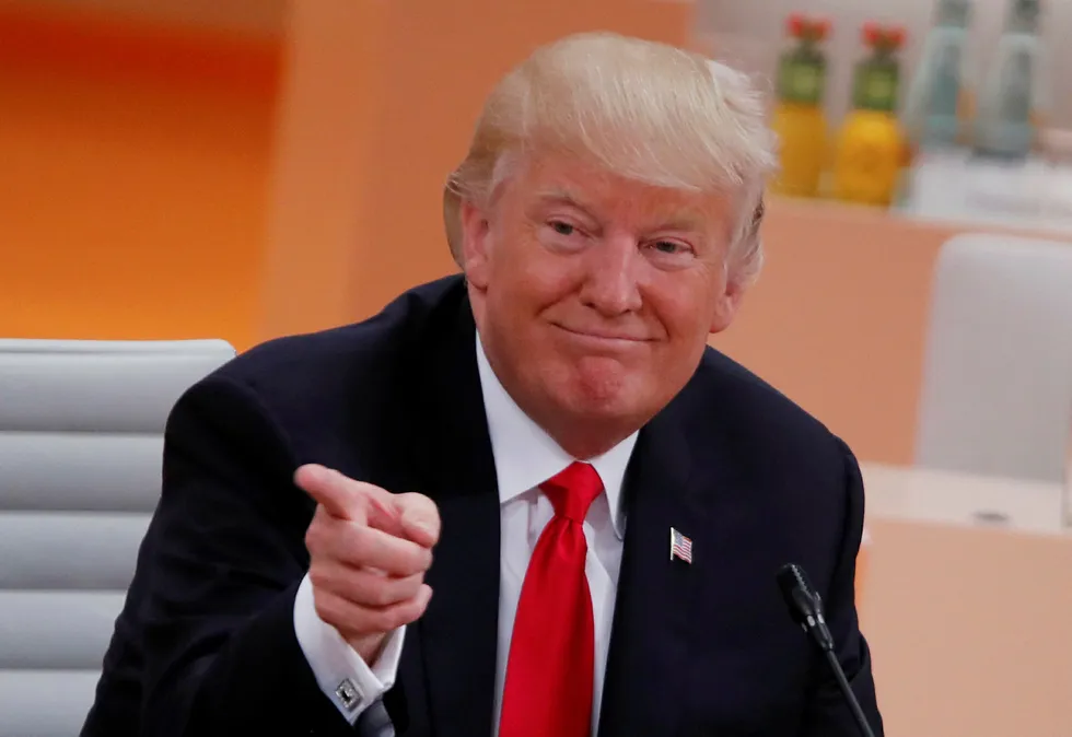 USAs president Donald Trump sier han gjør mye som er helt motsatt av det Russlands president Vladimir Putin vil. Foto: Wolfgang Rattay/Reuters/NTB scanpix