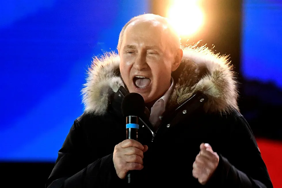 President Vladimir Putin la valgdagen til 18. mars, årsdagen for Russlands innlemmelse av Krim. Det var ett av få utenrikspolitiske signaler ved valget. Foto: Kirill Kudryavtsev/AFP/NTB Scanpix