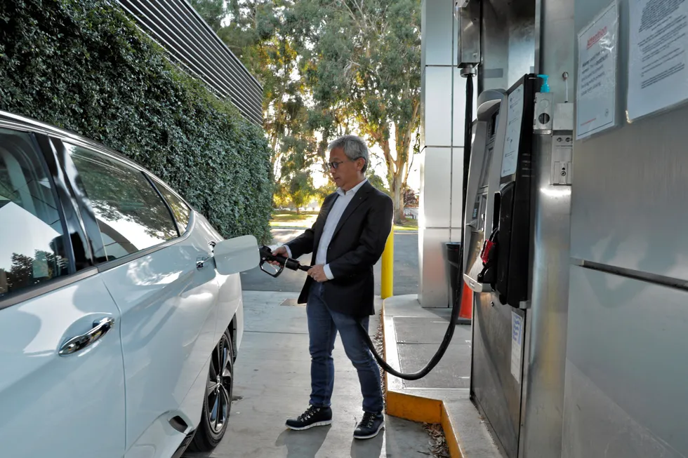 Driver Tadashi Ogitsu refuels his hydrogen-powered Honda Clarity at the Iwatani filling station in San Ramon, California.