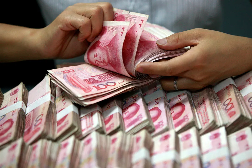 Den kinesiske kommunistledelsen vil slå ned på «markedskrokodiller» - spekulanter i finansnæringen. Foto: Chinatopix/AP/NTB scanpix