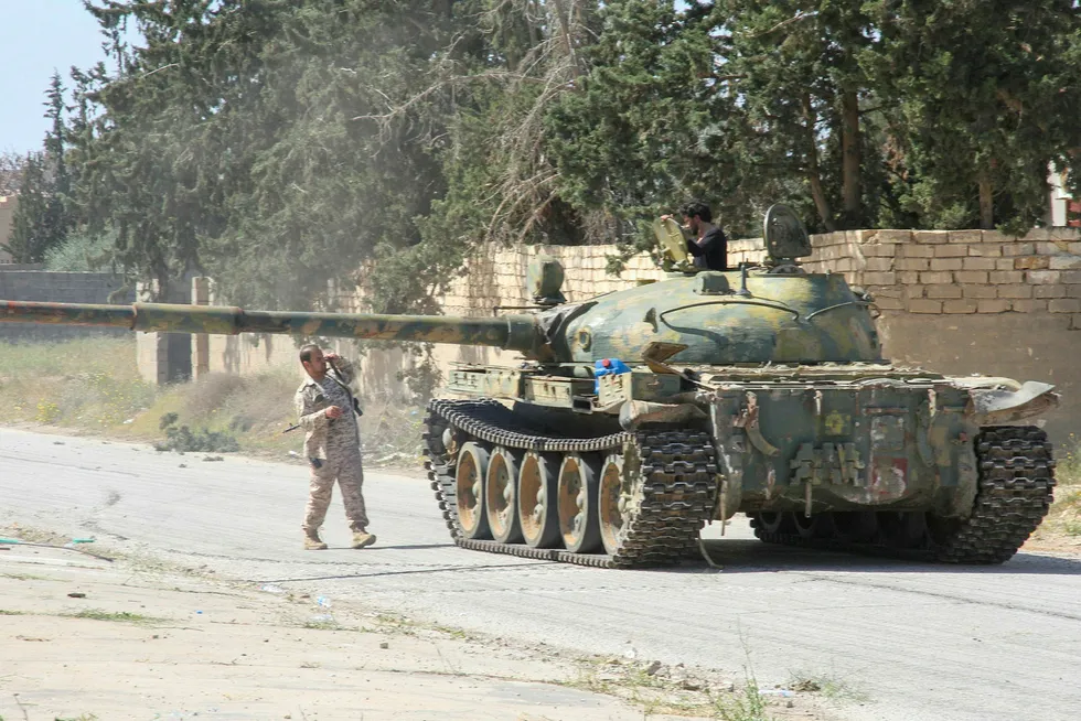 Fighting: Soldiers loyal to the internationally recognised Libyan Government of National Accord (GNA) drive a tanks in southern Tripoli