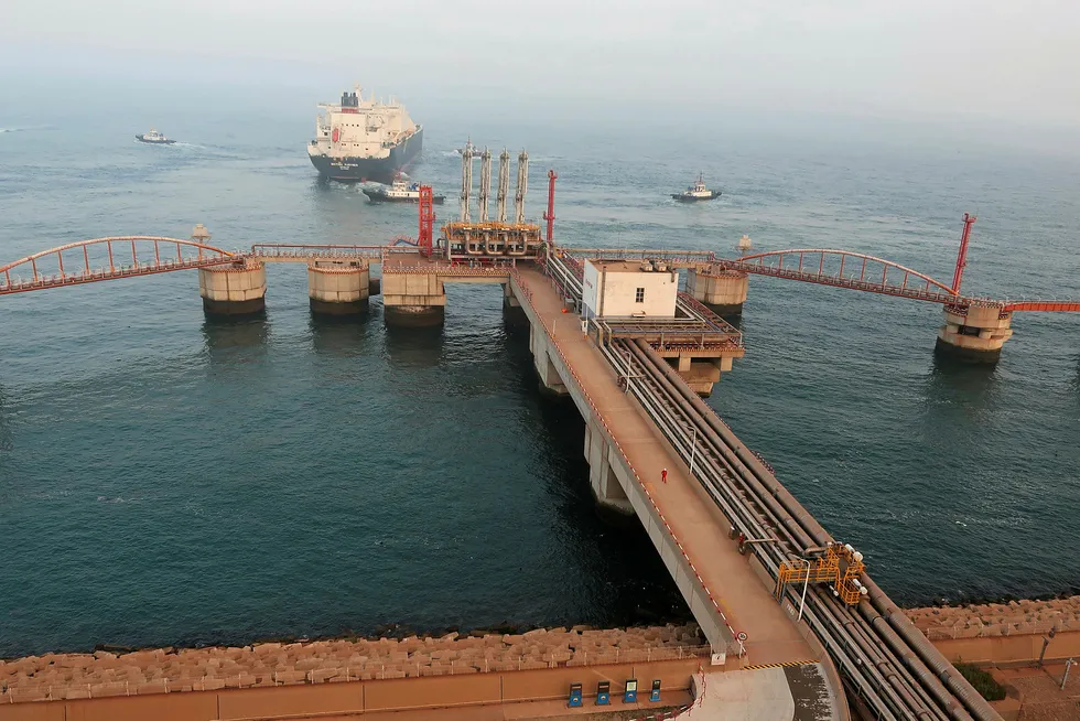 Imports rising: an LNG carrier leaves the dock after delivering a cargo to the receiving terminal in Dalian