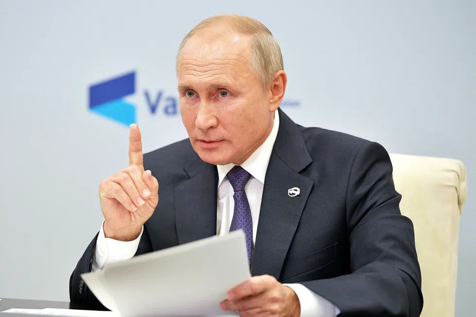 Interests: Russian President Vladimir Putin speaks in a video conference call to the Valdai Discussion Club in Moscow