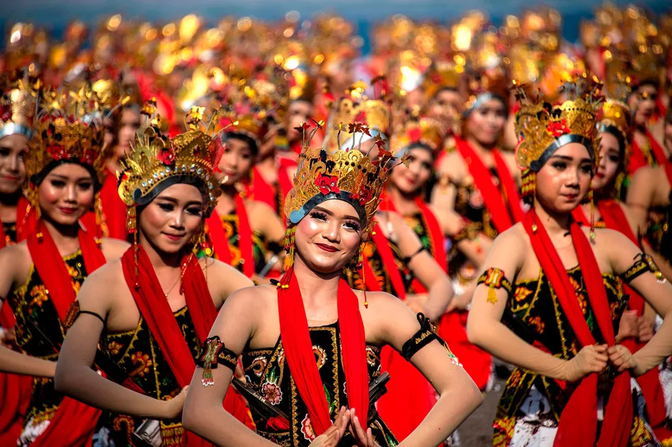 Celebration: traditional dancers performing during the Gandrung Sewu festival on Boom beach in Banyuwangi, East Java