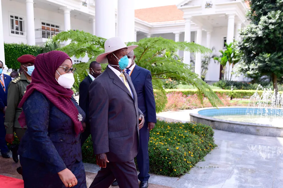 United: Uganda's President Yoweri Museveni (second left) and Tanzania's President Samia Hassan at the Statehouse in Entebbe, Uganda, where they signed agreements on the East African Crude Oil Pipeline