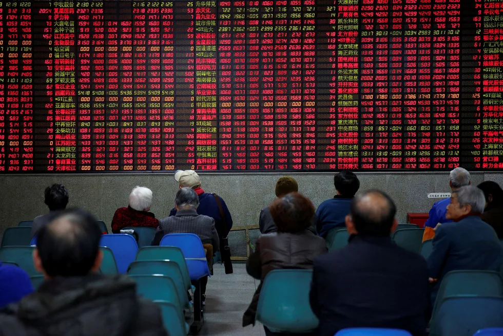 Kinesiske a-aksjer ved Shanghai-børsen kan bli godkjent hos den internasjonale indeksleverandøren MSCI på tirsdag. Kinesiske a-aksjer er verdens nest største i både verdi og omsetning. Foto: Aly Song/Reuters/NTB Scanpix