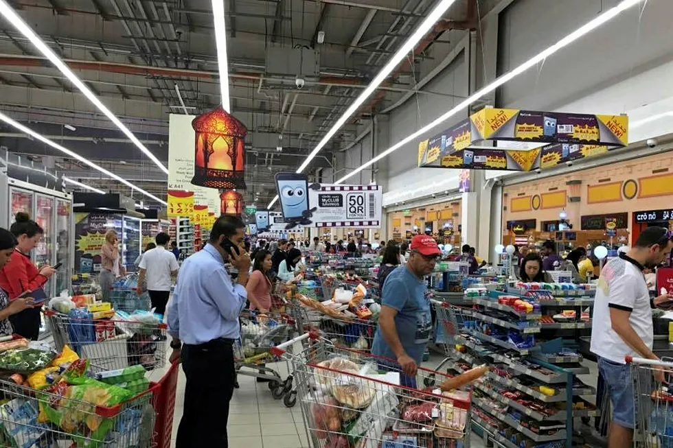 Panic buying: shoppers in a Doha supermarket stock up after Saudi Arabia closed its land border with Qatar this week