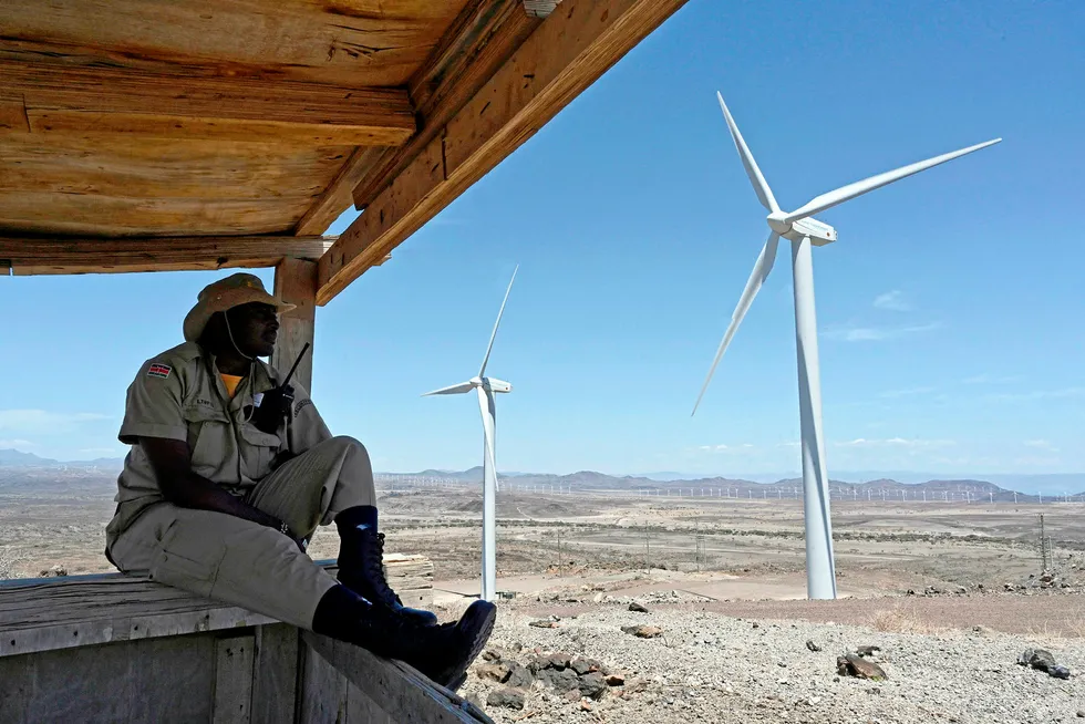 Power source: a security man guards turbines at the Lake Turkana wind farm in Kenya