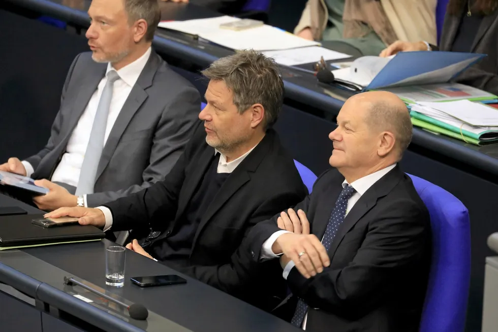 German Chancellor Olaf Scholz (right) in the Bundestag with the leaders of his coalition partners, the Green’s Robert Habeck (centre) and FDP head Christian Lindner
