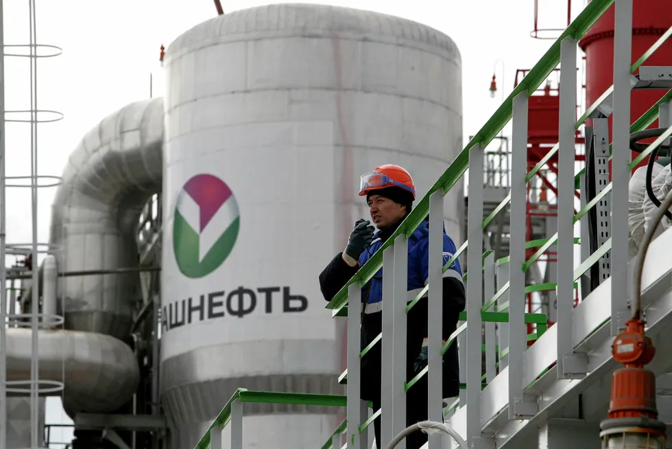 Connection lost: a worker talks via a radio at an oil installation in Bashkiria in Russia that is operated by regional producer Bashneft