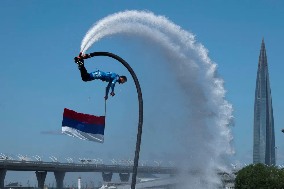 Turnaround: a member of Russian hydroflight team performs in St Petersburg with Gazprom's headquarters in the Lakhta Centre seen in background