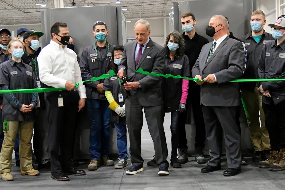US Senator Tom Carper cuts the ribbon on Bloom Energy's new electrolyser production line in Newark, Delaware.
