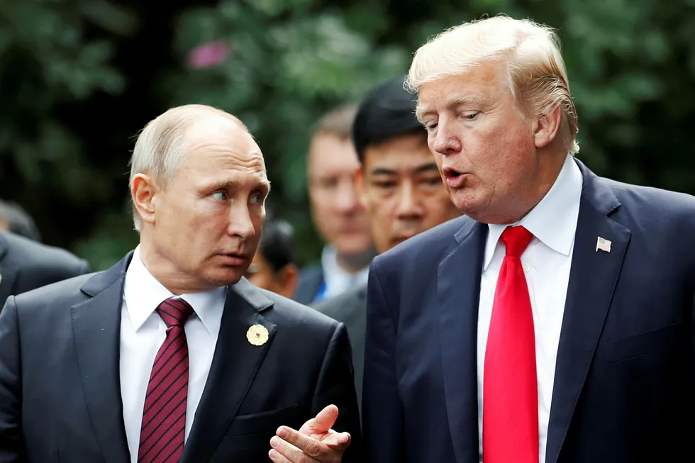 Donald Trump og Vladimir Putin har snakket sammen, og er enige om at Putin ikke blandet seg inn i det amerikanske valget- til fordel for Trump. Foto: JORGE SILVA