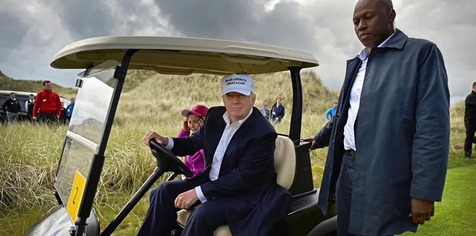US president Donald Trump, and his granddaughter Kai visit Trump International Golf Links in Aberdeen, Scotland.
