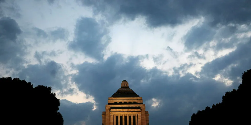 The National Diet building is illuminated during dusk in Tokyo. The parliament is expected to pass the offshore wind bill this month.