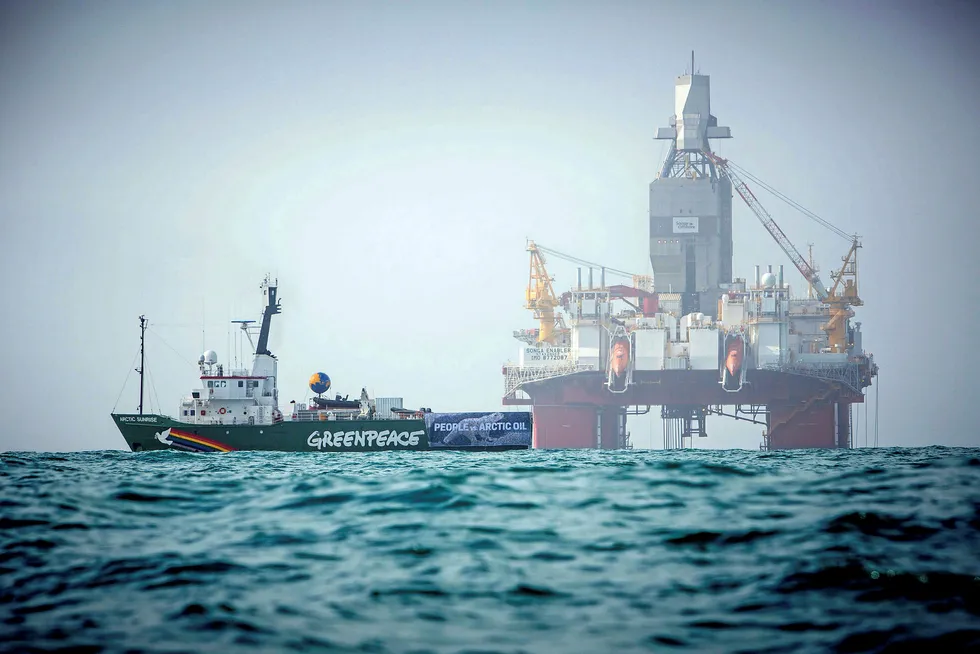 Climate action: Greenpeace's campaign ship Arctic Sunrise sails close to rig Transocean Enabler during earlier drilling work in the Barents Sea in 2017