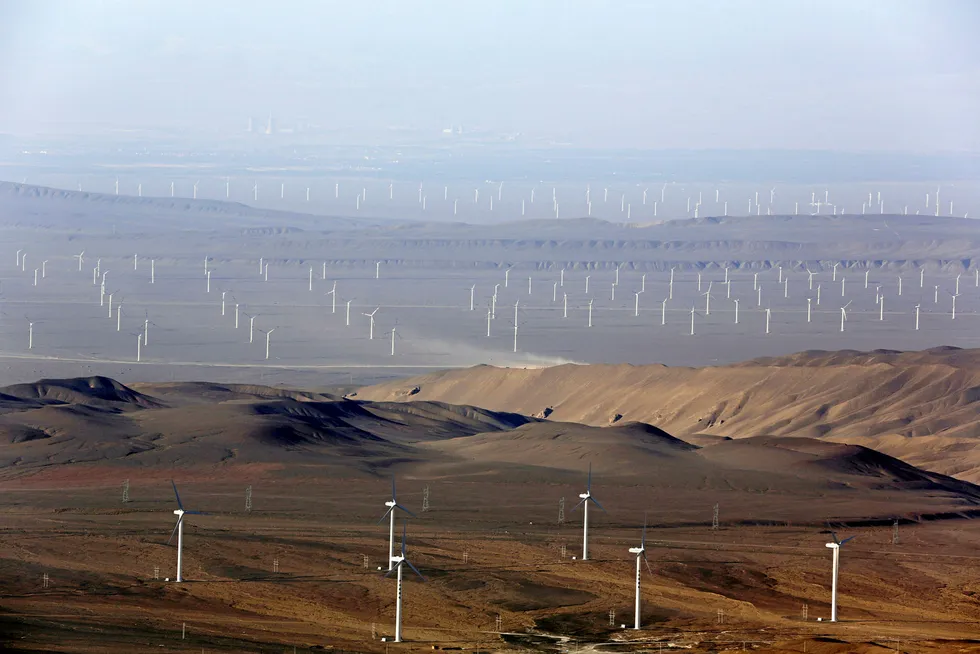 Hundreds of wind turbines sit in the Turfan Depression in China's northwestern Xinjiang