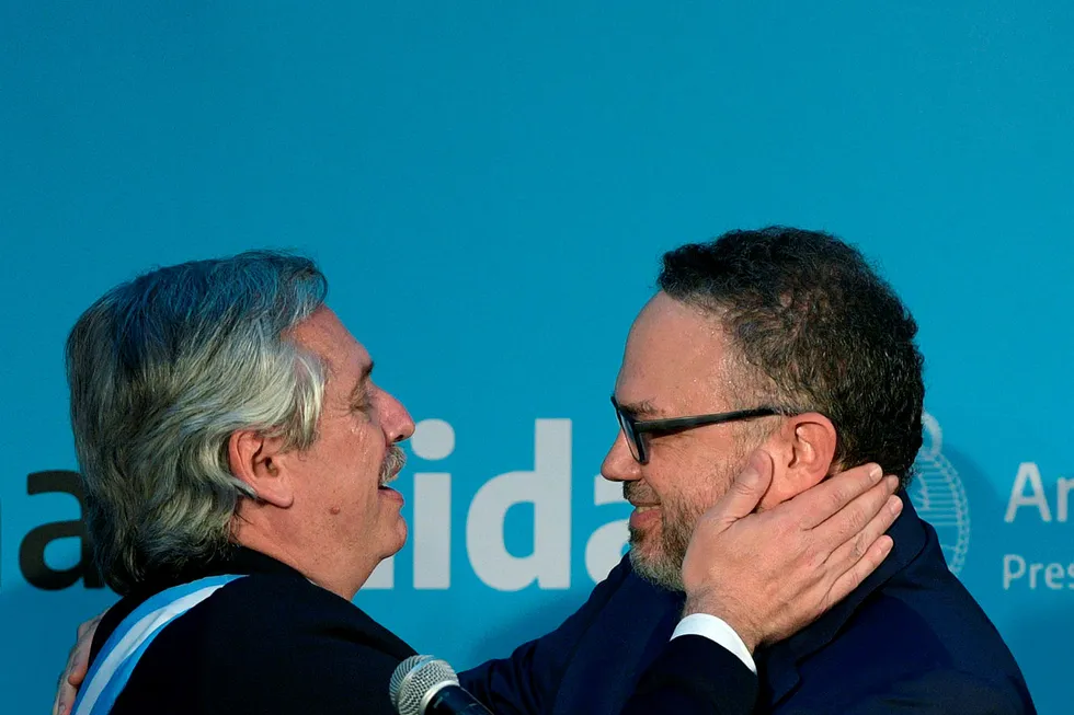 Reshuffle: Argentina's Productive Development Minister Matias Kulfas (right) embraces President Alberto Fernandez, but he may have lost influence under a reshuffle