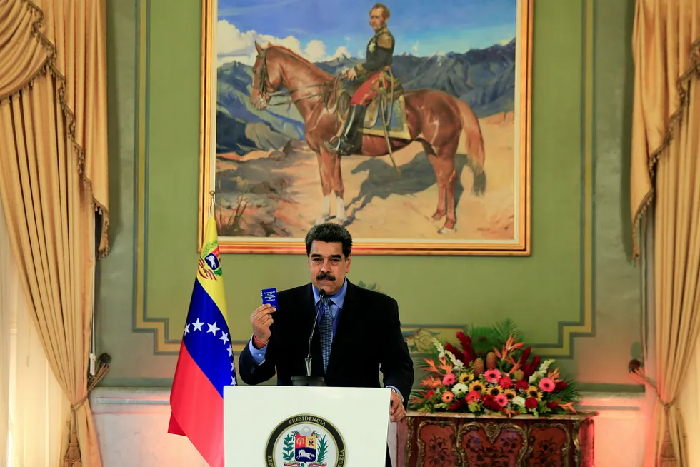Venezuela's President Nicolas Maduro holds a virtual news conference in Caracas, Venezuela.