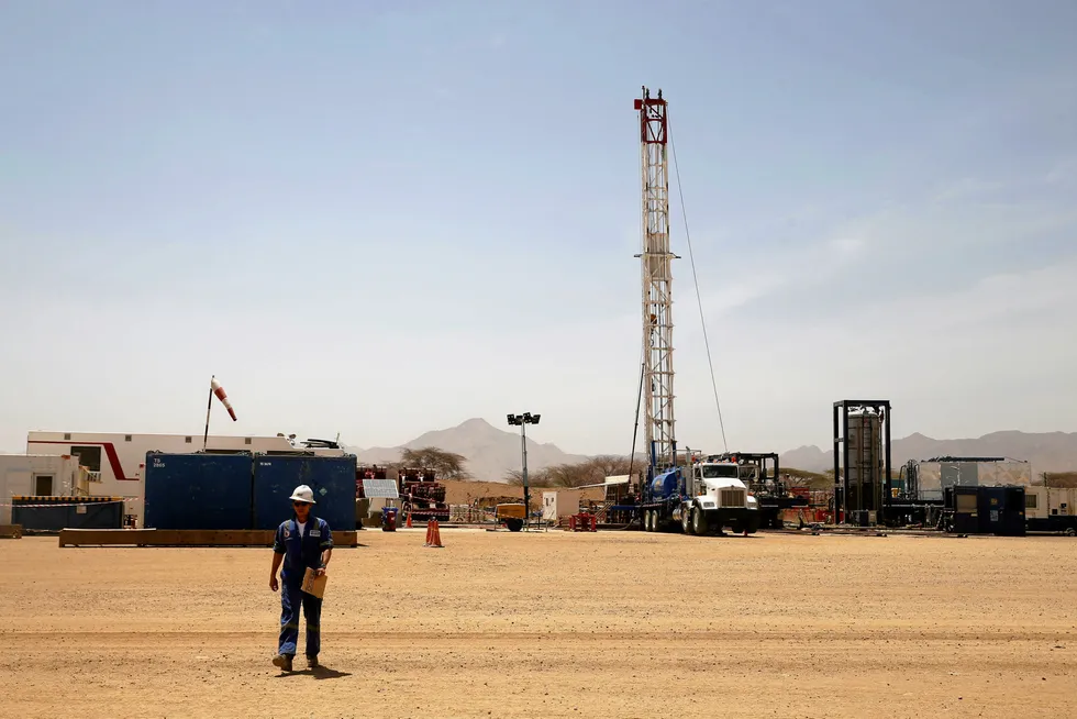 Licence extensions: a worker walks at a Tullow Oil explorational drilling site in Lokichar, Turkana County, Kenya